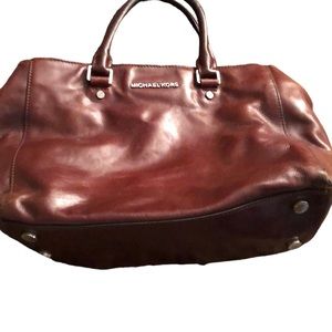 Micheal Kors vintage reddish brown main section with zip & pockets